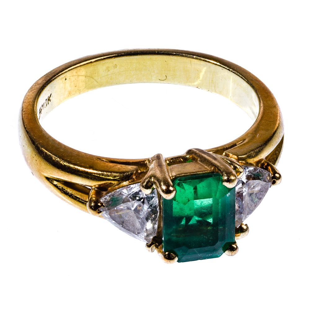 Appraisal: K YELLOW GOLD EMERALD AND DIAMOND RINGHaving emerald cut emerald