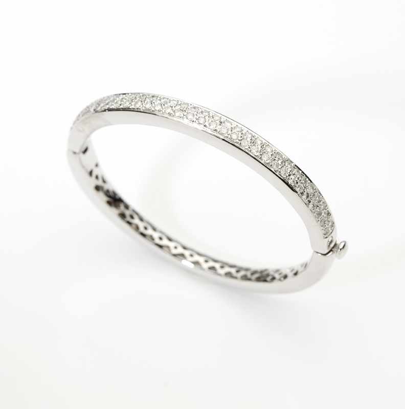 Appraisal: A diamond and white gold bangle The K white gold