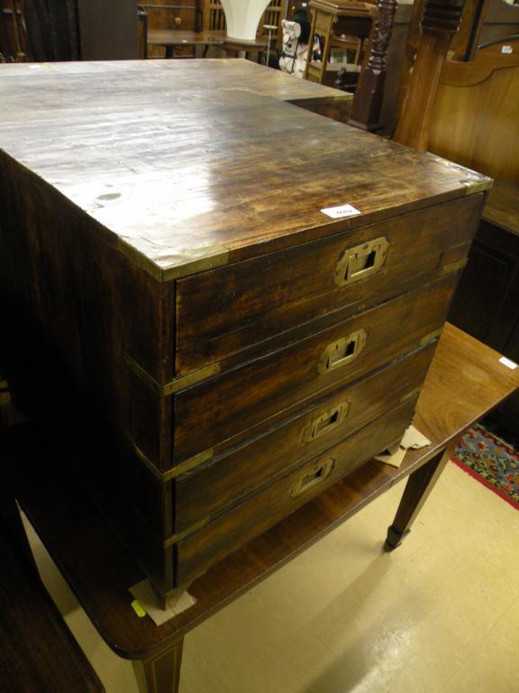 Appraisal: A campaign type hardwood chest with brass mounts and a