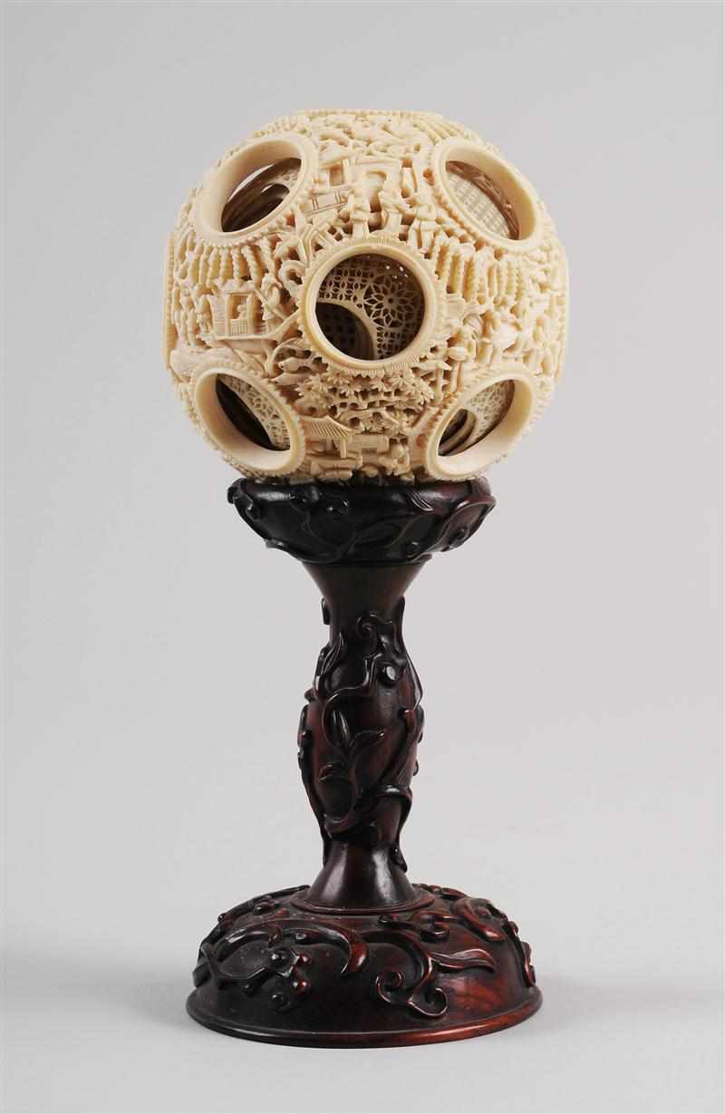 Appraisal: CHINESE CARVED IVORY PUZZLE BALL With multiple concentric filigree interior