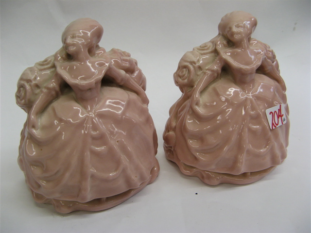 Appraisal: PAIR ROOKWOOD FIGURAL BOOKENDS American colonial ladies in long pink