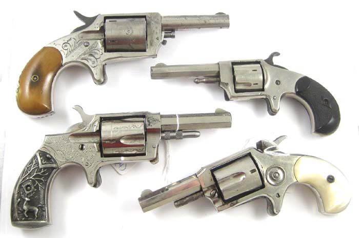 Appraisal: FOUR ANTIQUE SINGLE ACTION REVOLVERS including Norwich Arms Co rimfire