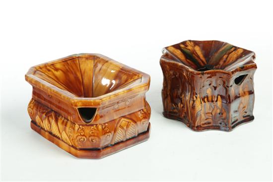 Appraisal: TWO ROCKINGHAM SPITTOONS American - Brown mottled glaze and gothic