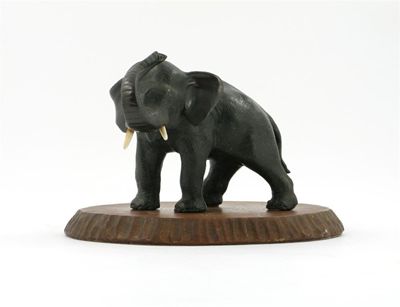 Appraisal: A Japanese bronze model of an elephant the pachyderm standing