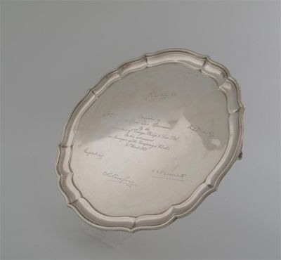 Appraisal: A modern salver shaped outline with facsimile signatures and presentation