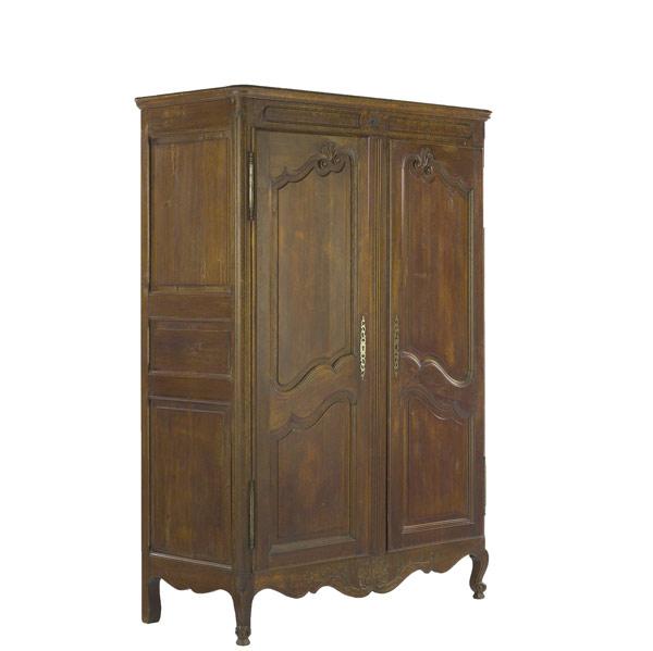 Appraisal: Country French walnut armoire with two doors th C x