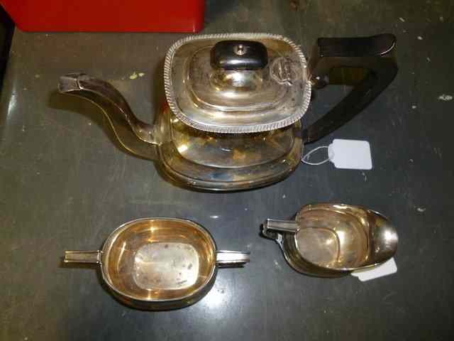 Appraisal: A SILVER COFFEE POT together with a silver sugar basin