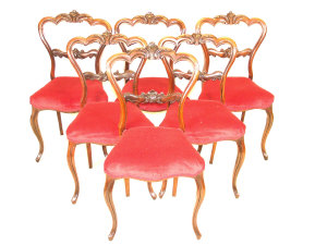 Appraisal: Six Victorian rosewood balloon back chairs with foliate carved backs