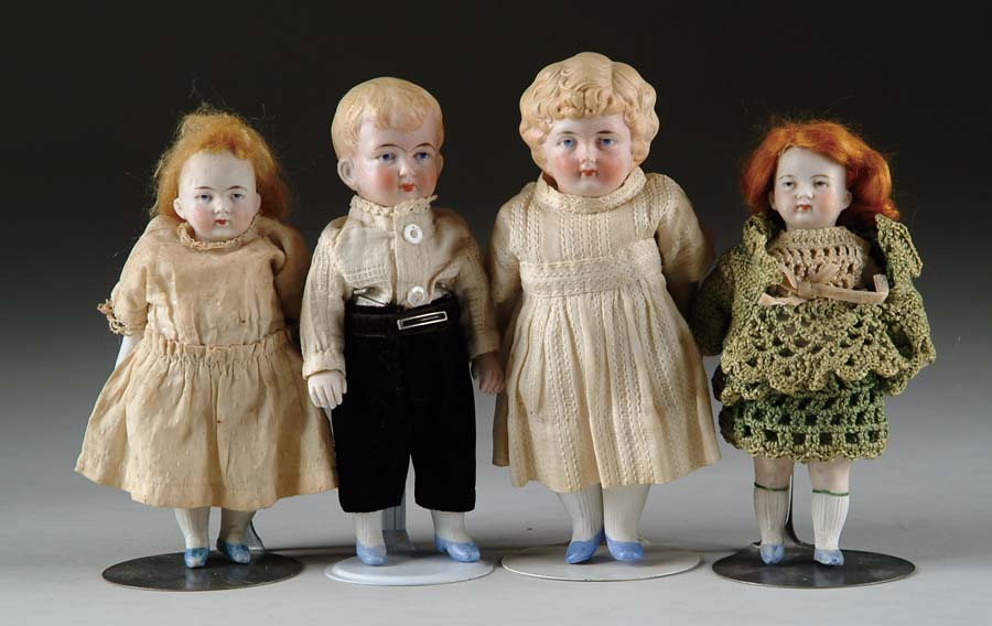 Appraisal: LOT OF FOUR JOINTED ALL-BISQUE DOLLS The first pair of