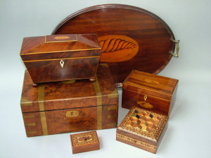 Appraisal: An Edwardian oval mahogany twin handled tea tray with shell