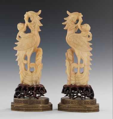 Appraisal: A Pair of Carved Hardstone Phoenix Figures At one time