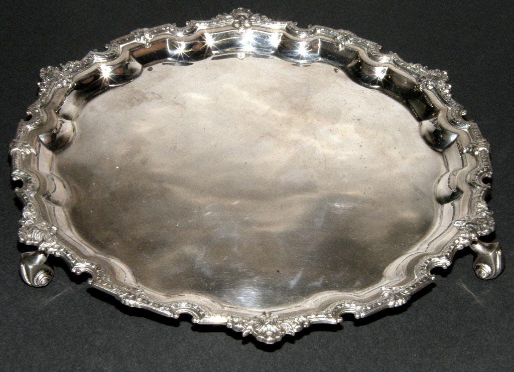 Appraisal: Small silver pie crust salver with a cast shell border