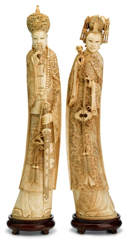 Appraisal: Pair of Chinese elephant ivory figuresTall Emperor and empress figures