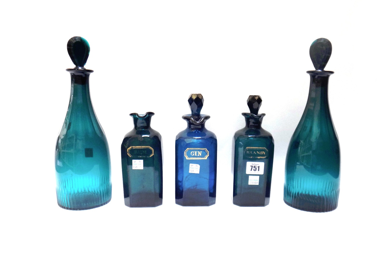 Appraisal: Two Georgian green glass decanters of canted square form gilt