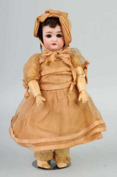 Appraisal: German Bisque C M B Child Doll Description C M