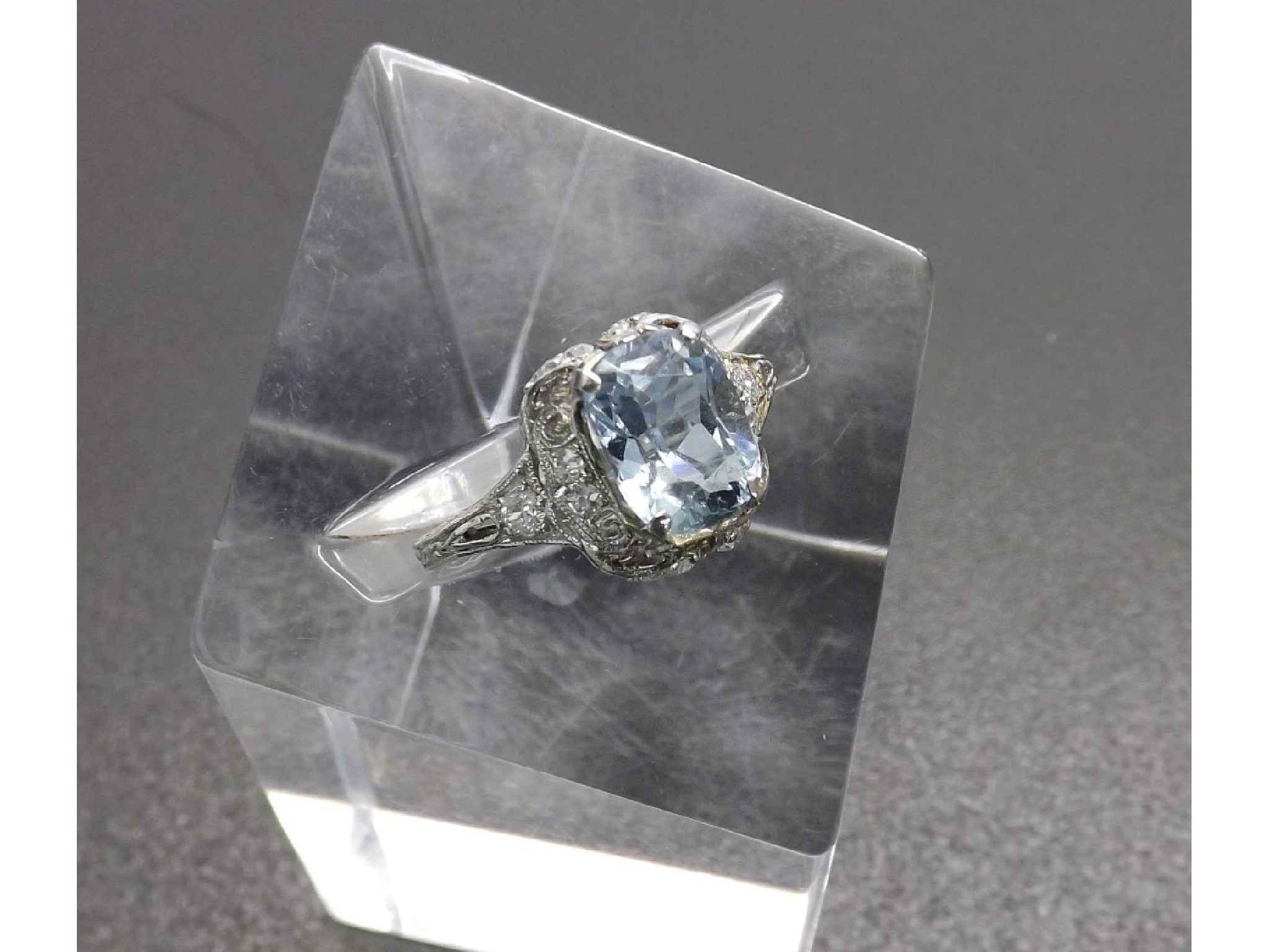 Appraisal: Art Deco style platinum and diamond aquamarine ring the principal