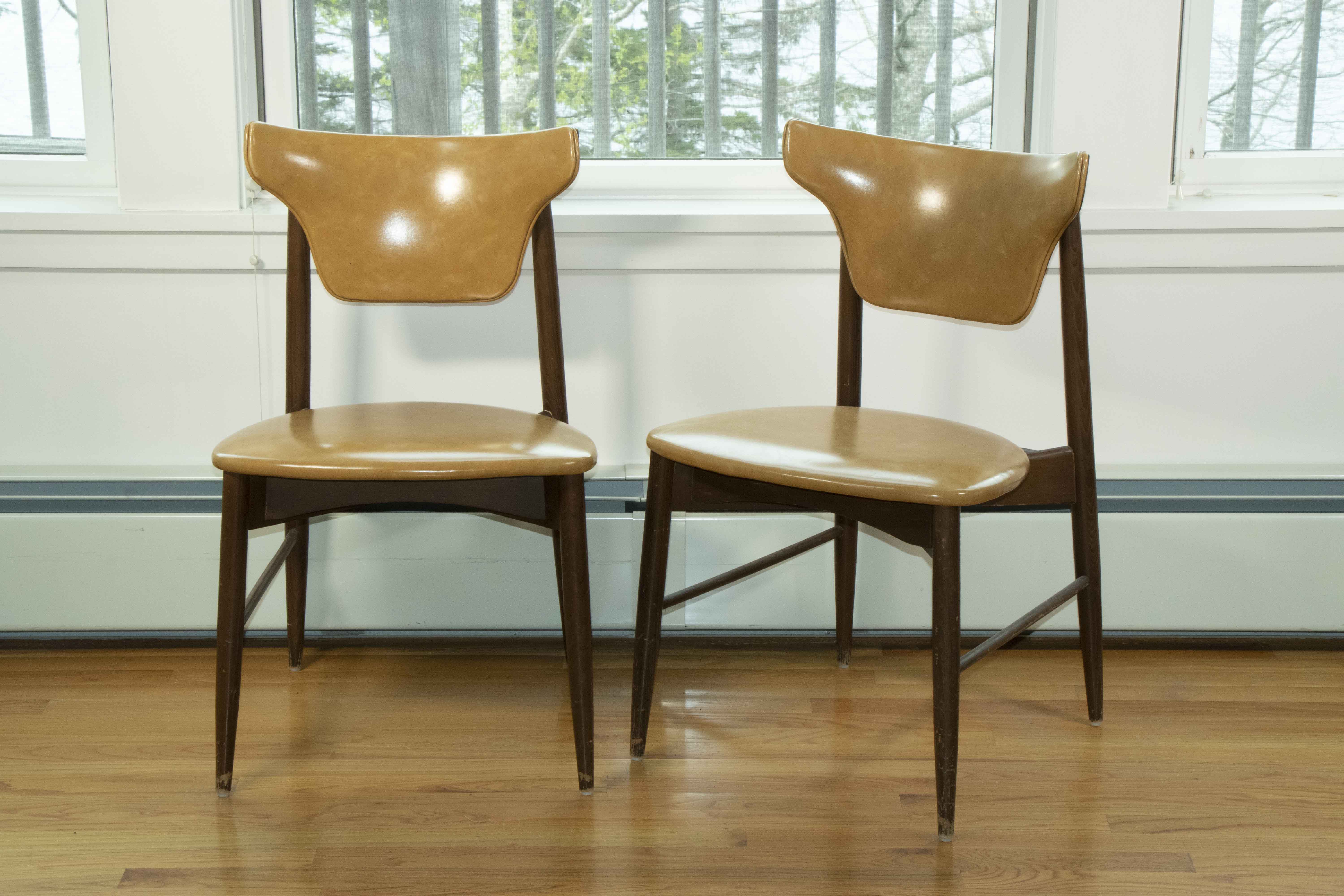 Appraisal: PR OF MODERN CHAIRS A pair of matching vinyl-cushioned chairs