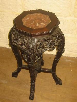 Appraisal: AN ORIENTAL PADOUK WOOD JARDINIERE STAND of octagonal form the