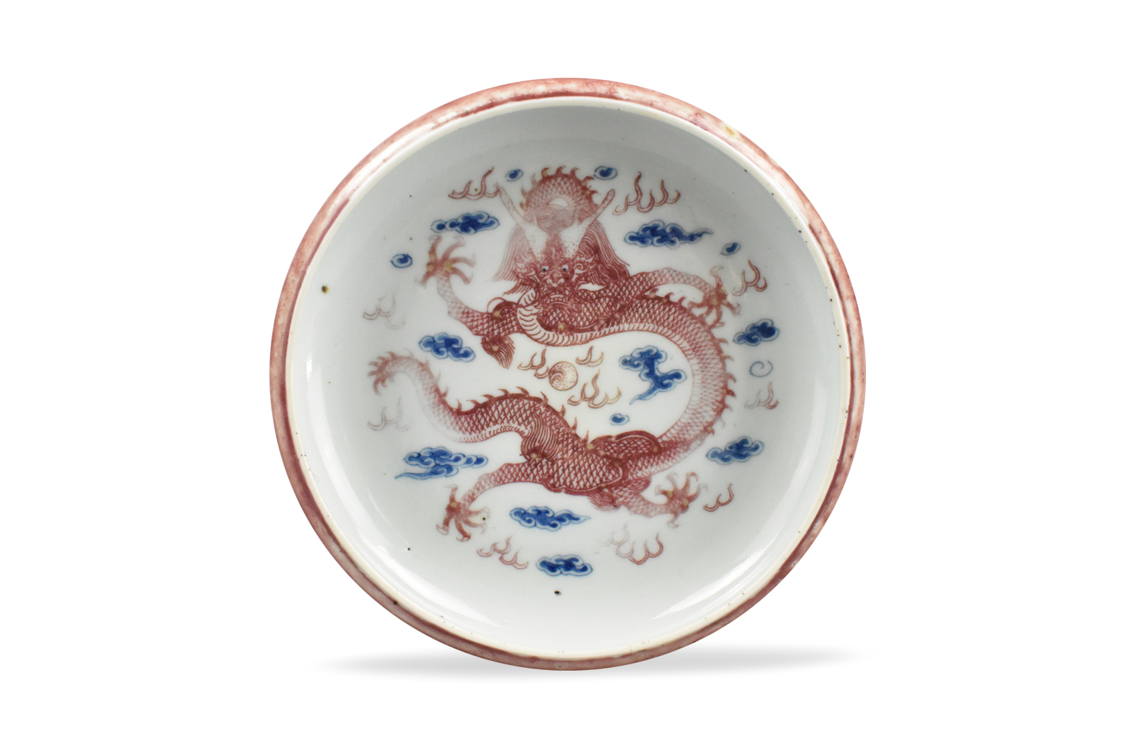 Appraisal: A Chinese blue and copper red dragon washer dating from