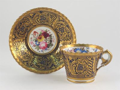 Appraisal: A Chamberlain's Worcester cup and saucer well painted with colourful