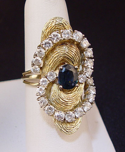 Appraisal: A WOW DIAMOND SAPPHIRE RING K yellow gold ring Two