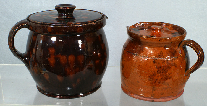 Appraisal: glazed redware bean pots with manganese decoration each with chips