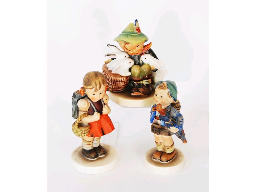 Appraisal: THREE GOEBEL POTTERY FIGURES comprising 'Hum Playmates' stamped small stylised