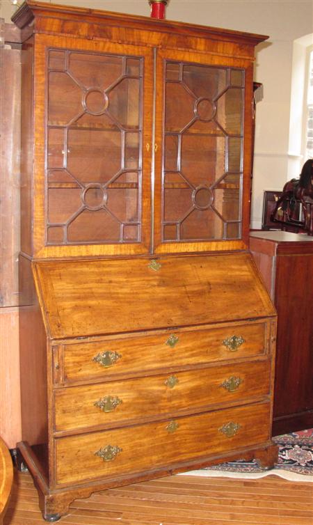 Appraisal: A George III mahogany bureau bookcase the projected moulded cornice