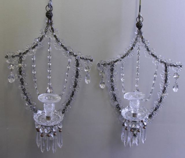 Appraisal: Pair of Cut Crystal Skeleton Form Sconces Very decorative and