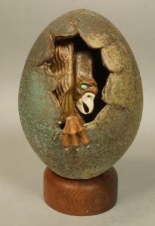 Appraisal: Modern Sculpture THOMPSON ' Egg form sculpture with emerging dragon