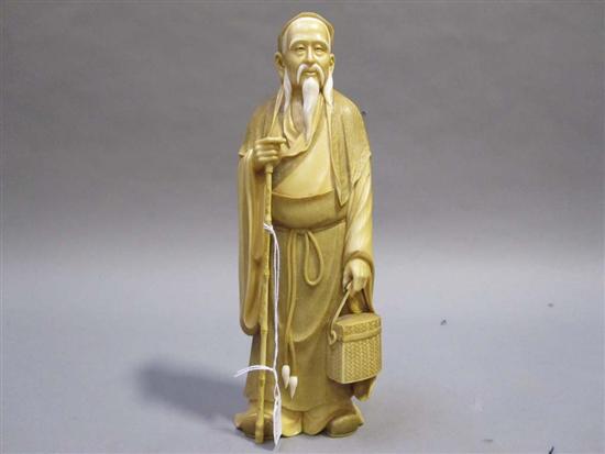 Appraisal: JAPANESE IVORY OKIMONO OF A BEARDED ELDER th C Holding