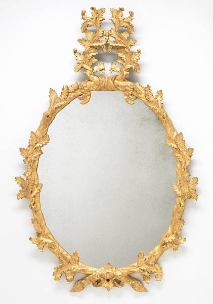 Appraisal: A George III style carved giltwood mirror modern height in