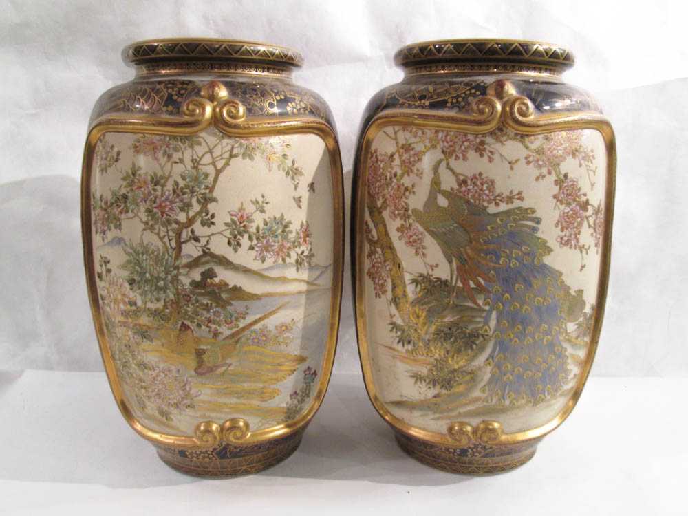 Appraisal: PAIR JAPANESE SATSUMA POTTERY VASES featuring reserves of peacocks on