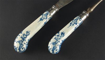 Appraisal: A Bow porcelain handled knife and fork painted with blue