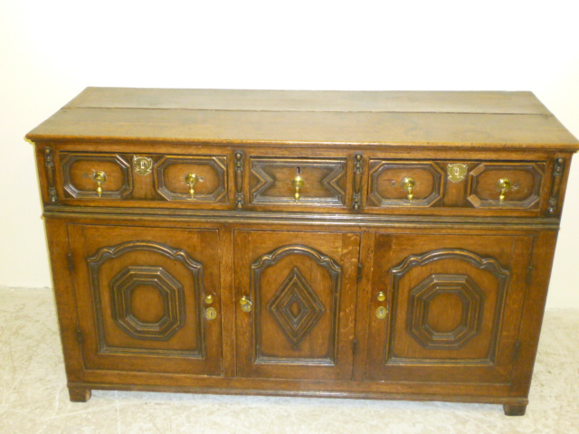 Appraisal: AN OAK ENCLOSED DRESSER early to mid th century the