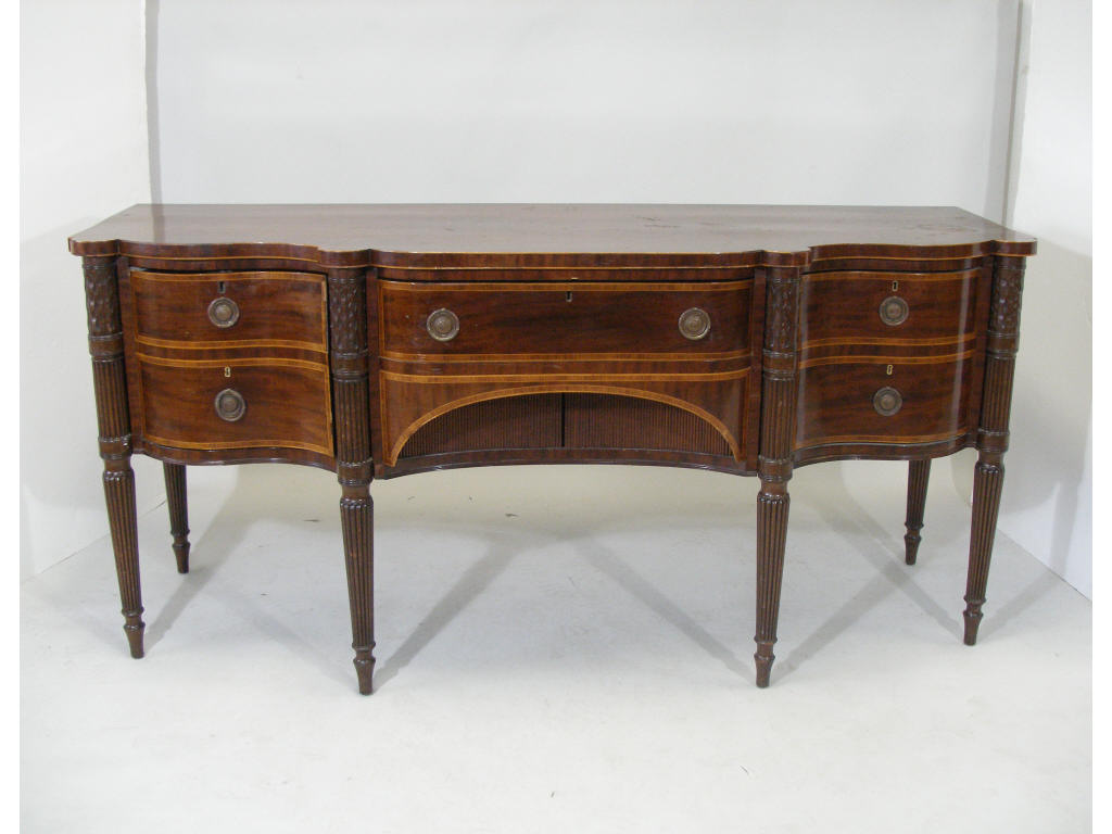 Appraisal: Inlaid Sheraton Sideboard English th c mahogany and mahogany veneers