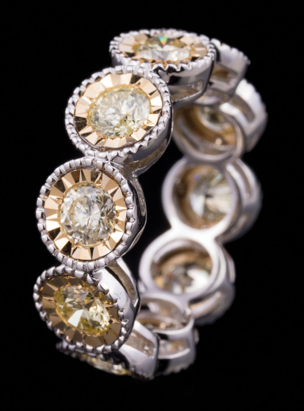 Appraisal: kt White and Yellow Gold and Diamond Eternity Ring comprised