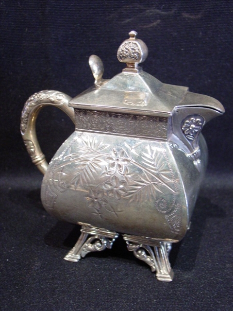 Appraisal: SMALL SILVERPLATED TEA POT