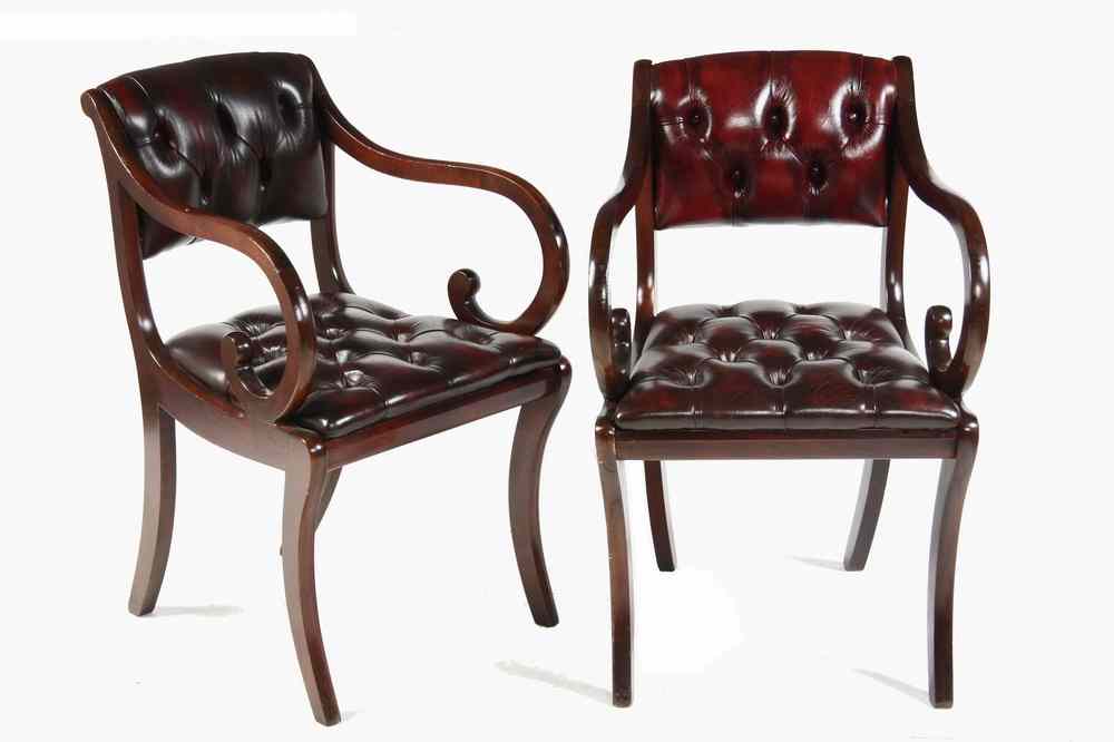 Appraisal: ARM CHAIRS - Eight mahogany Regency style carved arm chairs