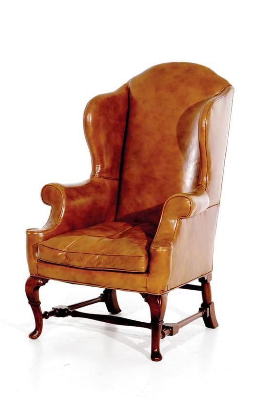 Appraisal: Queen Anne style leather and mahogany wing chair th century