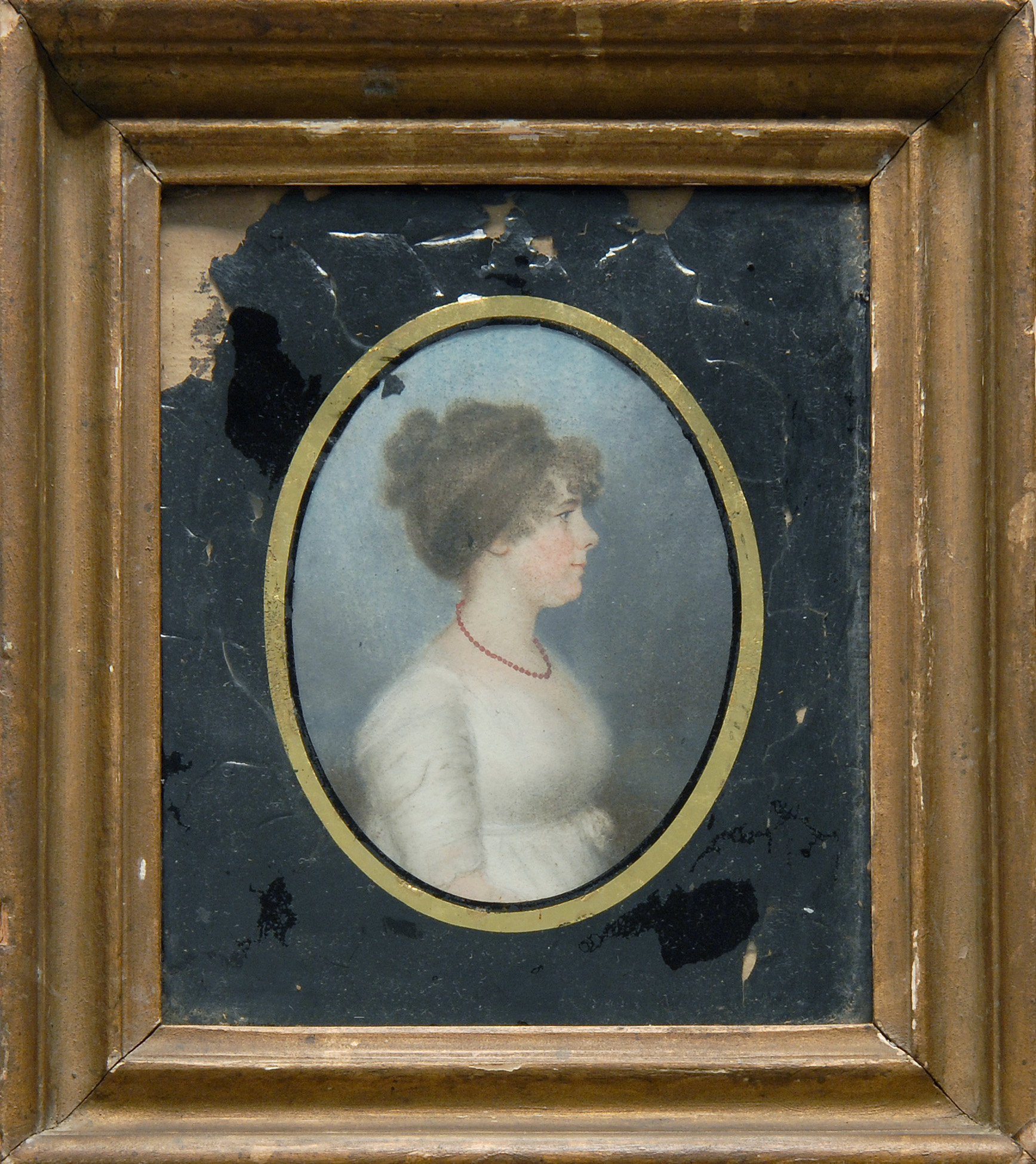 Appraisal: FRAMED MINIATURE PORTRAIT OF A YOUNG LADY Reverse-painted glass mat