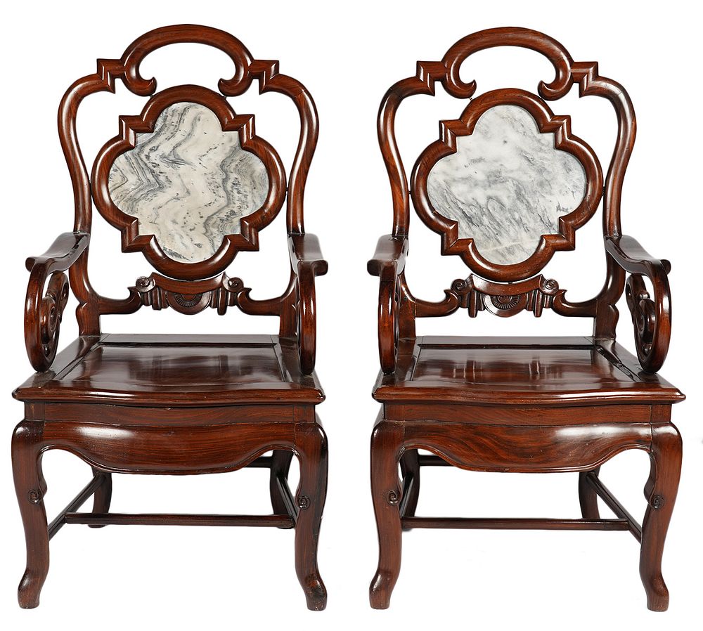 Appraisal: Chinese Hardwood Chairs with Dream-stone Inserts Chinese hardwood intricately carved