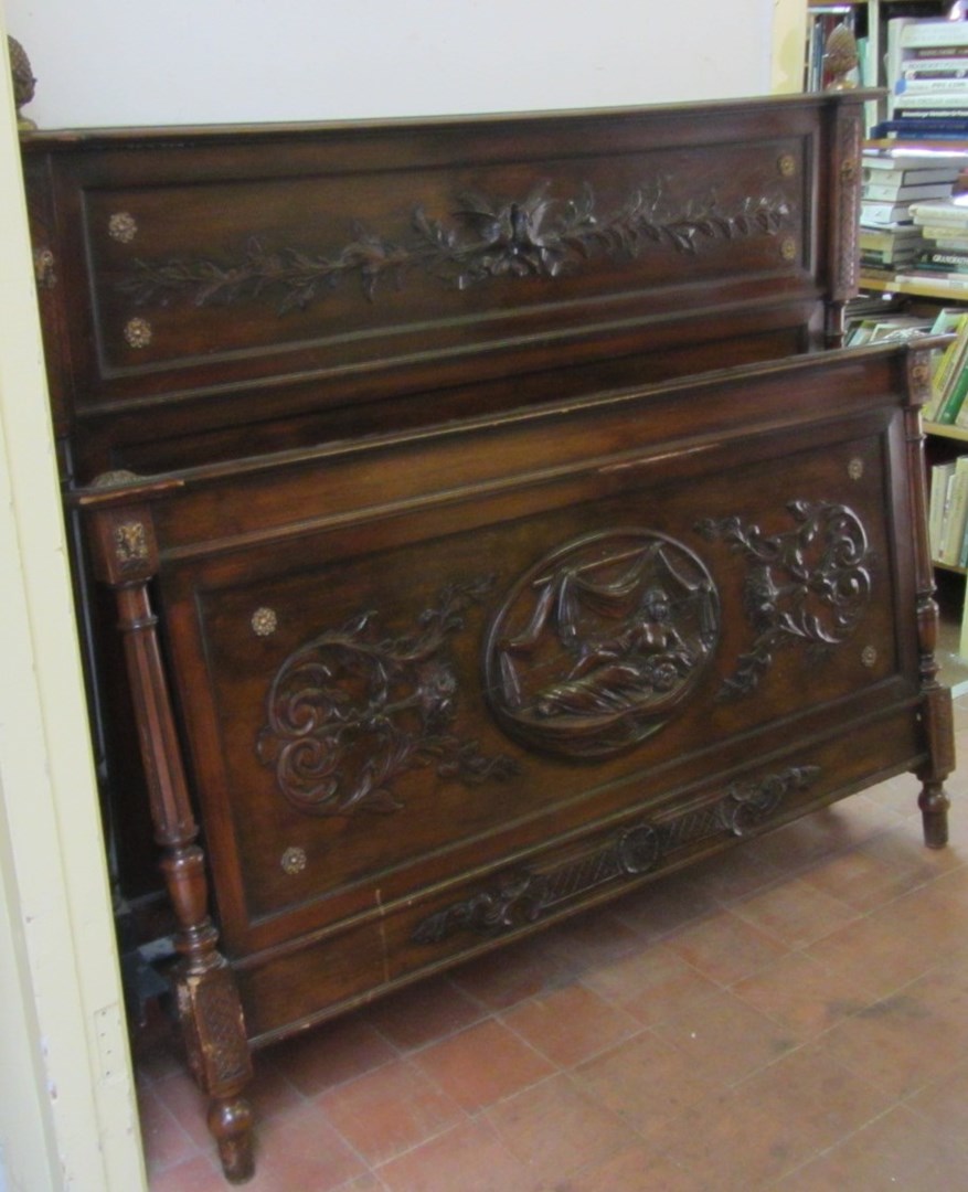 Appraisal: A French gilt metal mounted mahogany double bed with acanthus