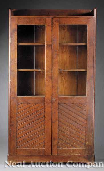 Appraisal: An American Arts and Crafts Figured Yellow Pine Bookcase c