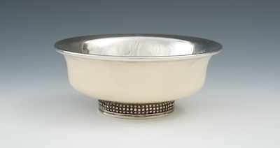 Appraisal: A Turned Ivory Bowl with Silver Metal Mounts Apprx D