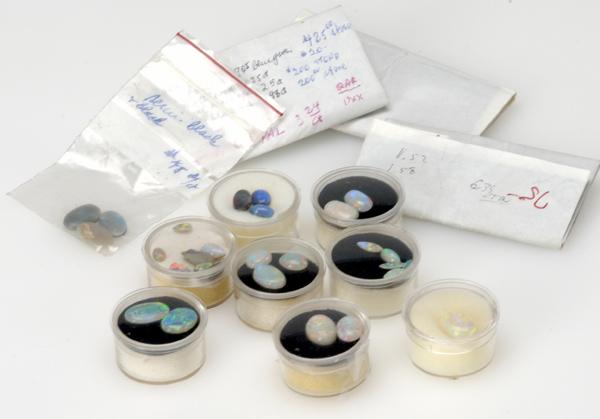 Appraisal: UNMOUNTED OPAL CABOCHONS Thirty stones include black opals boulder opals