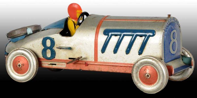 Appraisal: Chein Tin Wind-Up Silver Flash Race Car Toy Description Includes