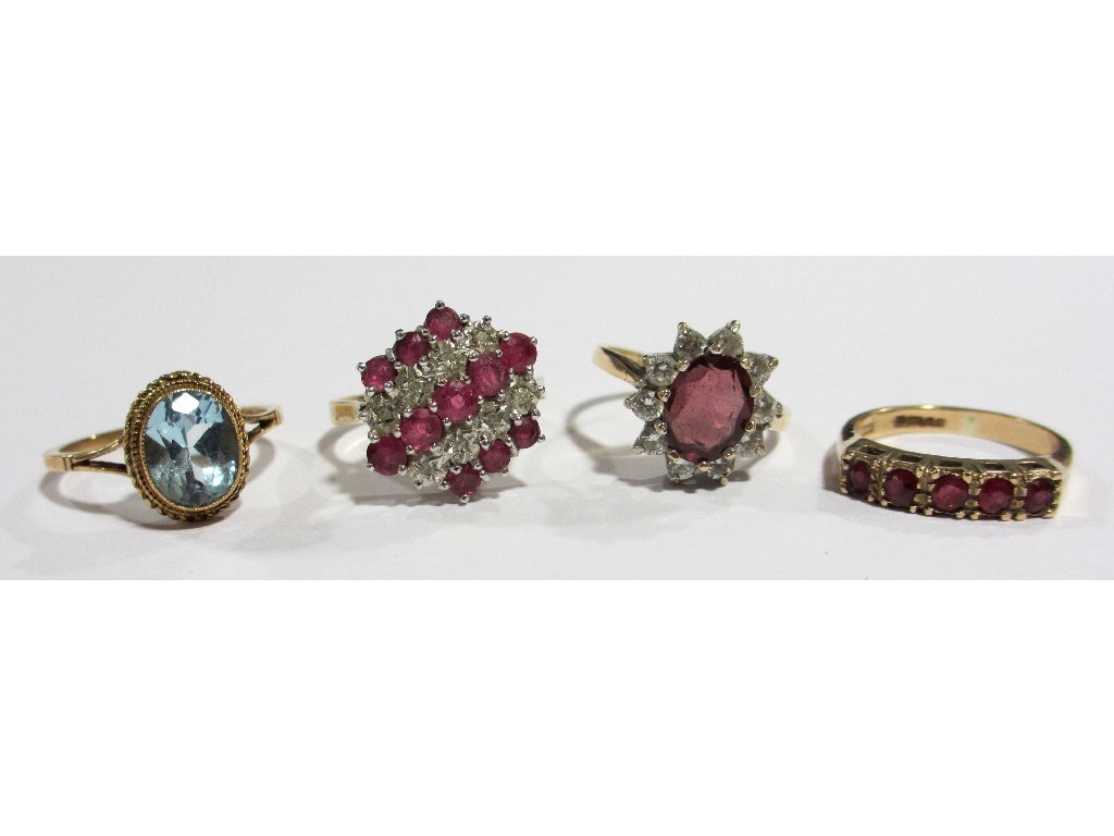 Appraisal: Four ct gold dress rings including a garnet and zircon