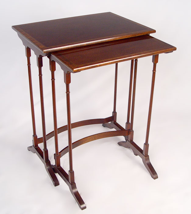 Appraisal: NEST OF TWO BANDED MAHOGANY SIDE TABLES BY BAKER Metal