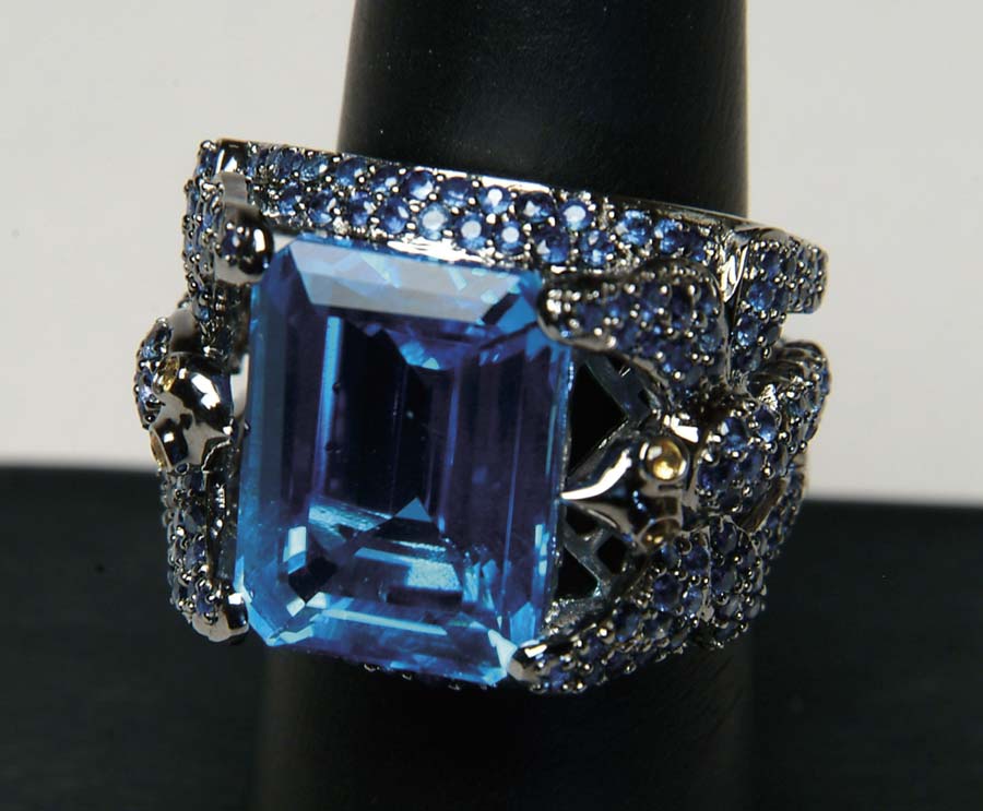 Appraisal: BLUE TOPAZ AND SAPPHIRE RING Massive kt white gold setting